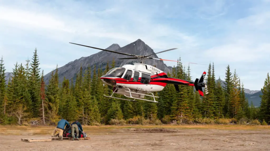 Helicopter Flight Above Banff Tourists