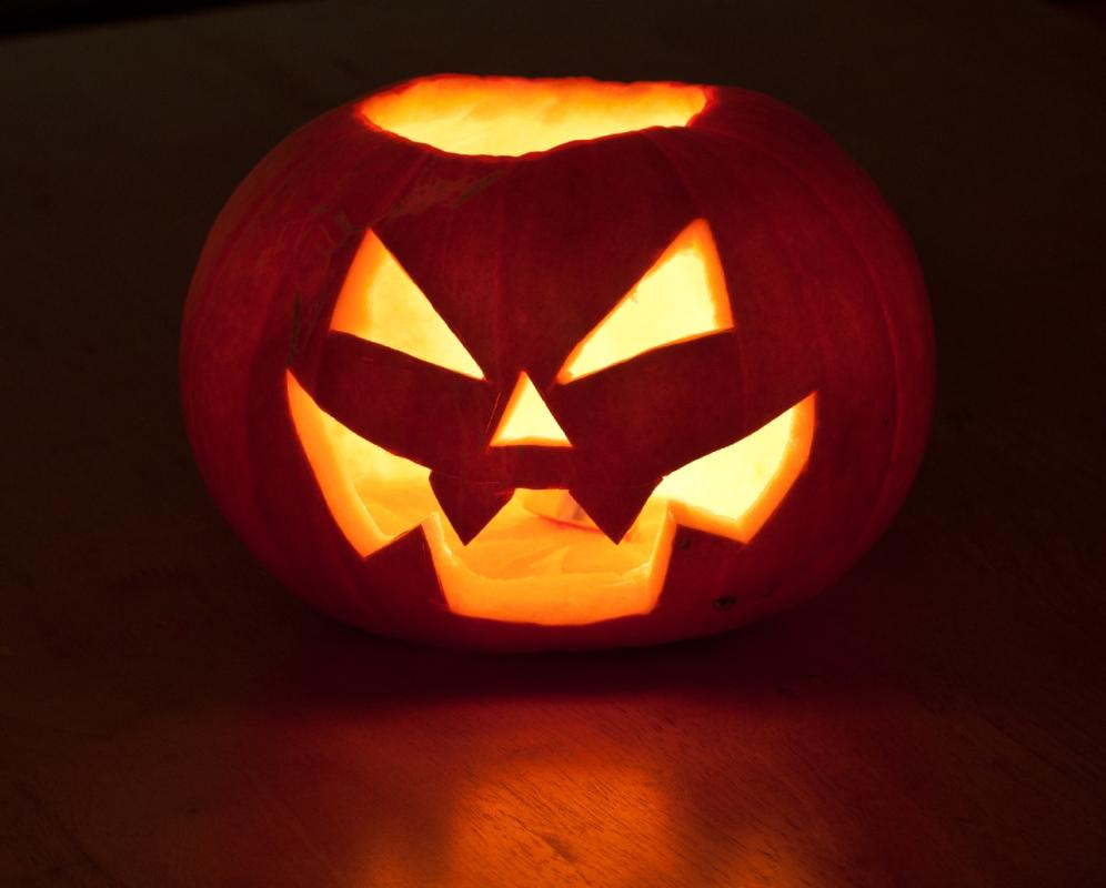 A carved Halloween pumpkin in Banff lit from inside