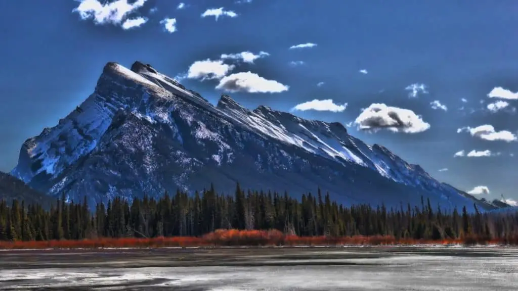 Mount Rundle towering above Vermilion Lakes in Banff