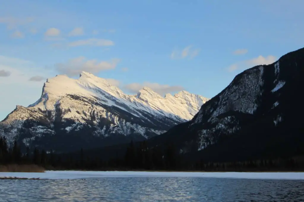 A snow-capped Mount Rundle dominating Vermilion Lakes in Banff in winter