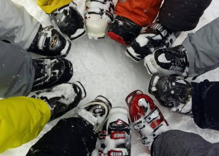 Ski boots in a circle in the snow on Lake Louise Ski Resort