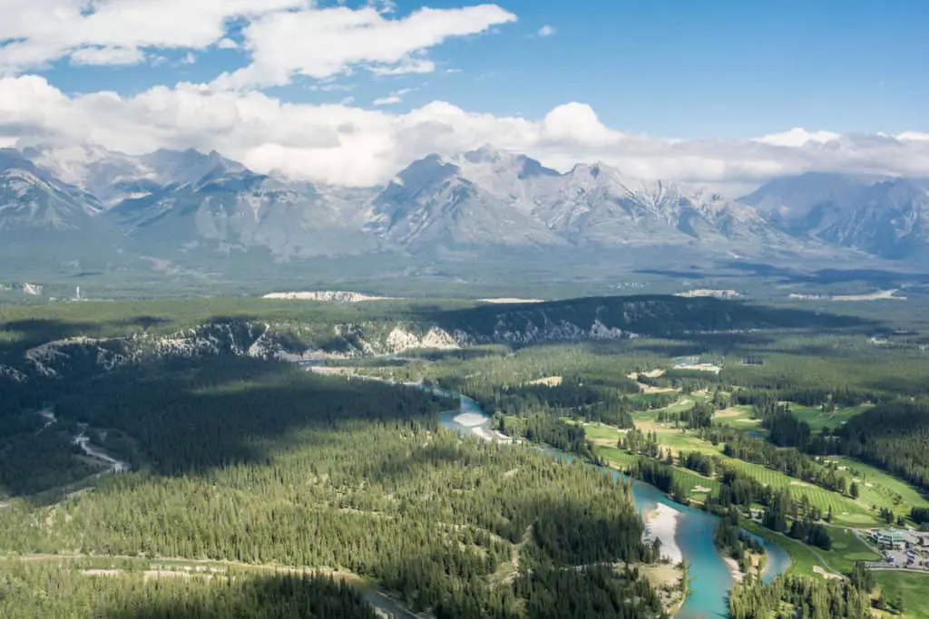 Aerial view of the Banff Springs Golf Course with the Canadian Rockies in the background