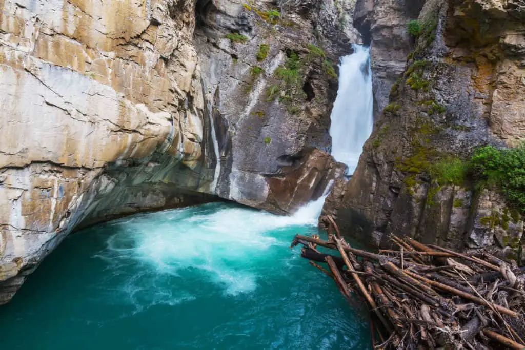 The Johnston Canyon Upper Falls in Banff showing with its remarkable turquoise water color