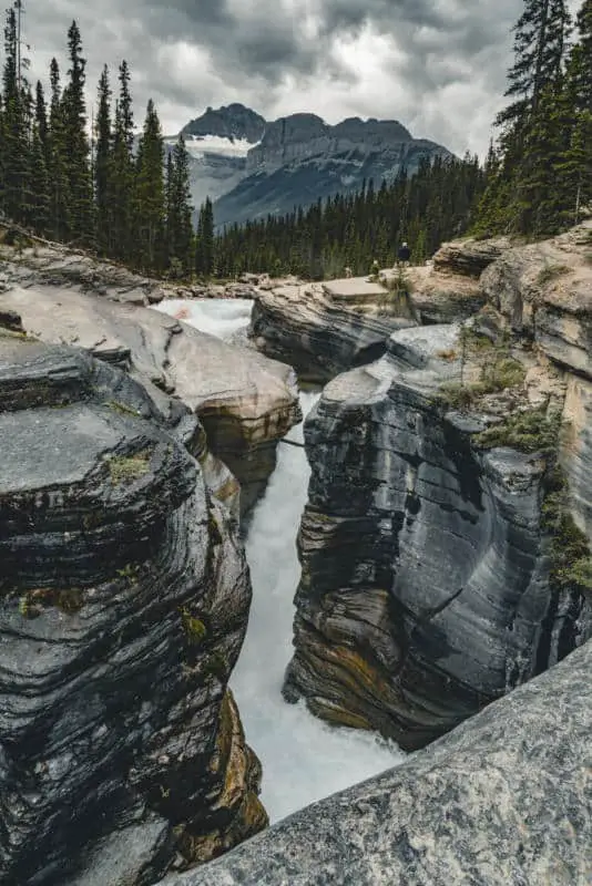 Mistaya Canyon near the Icefields Parkway with the Rocky Mountains looming overhead