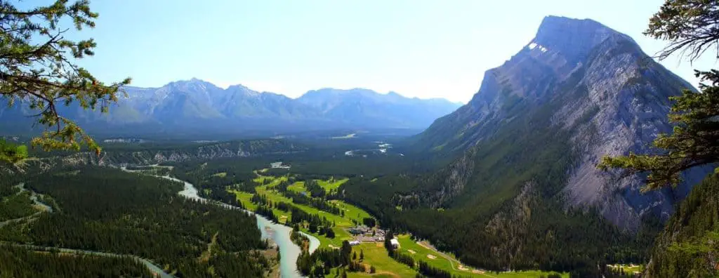 Panoramic aerial view of the Banff Springs Golf Course, with the impressive Mount Rundle looming overhead
