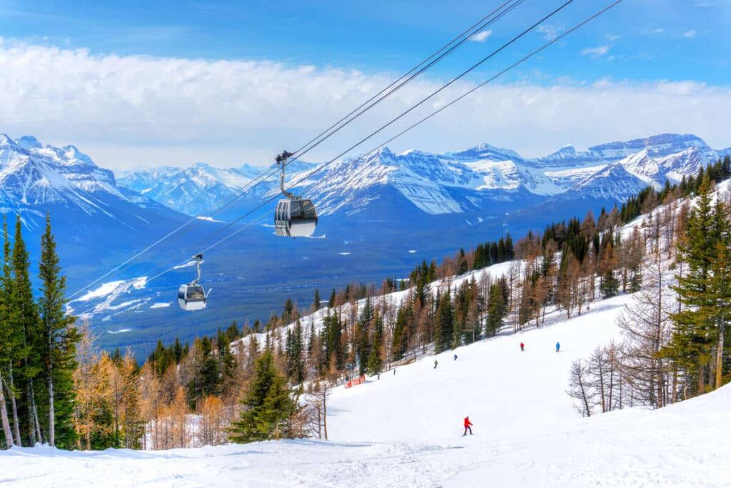 Cable cars going up Whitehorn Mountain at Lake Louise Ski Resort