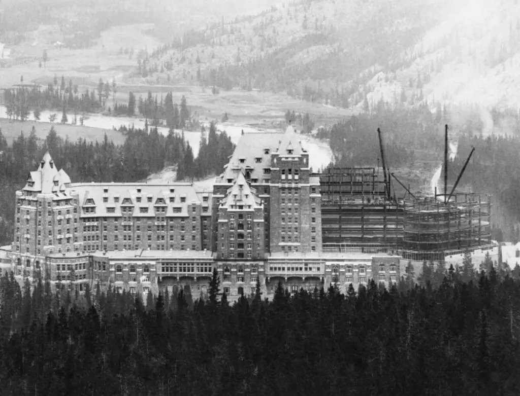 The erection of the south wing of the Banff Springs Hotel in progress