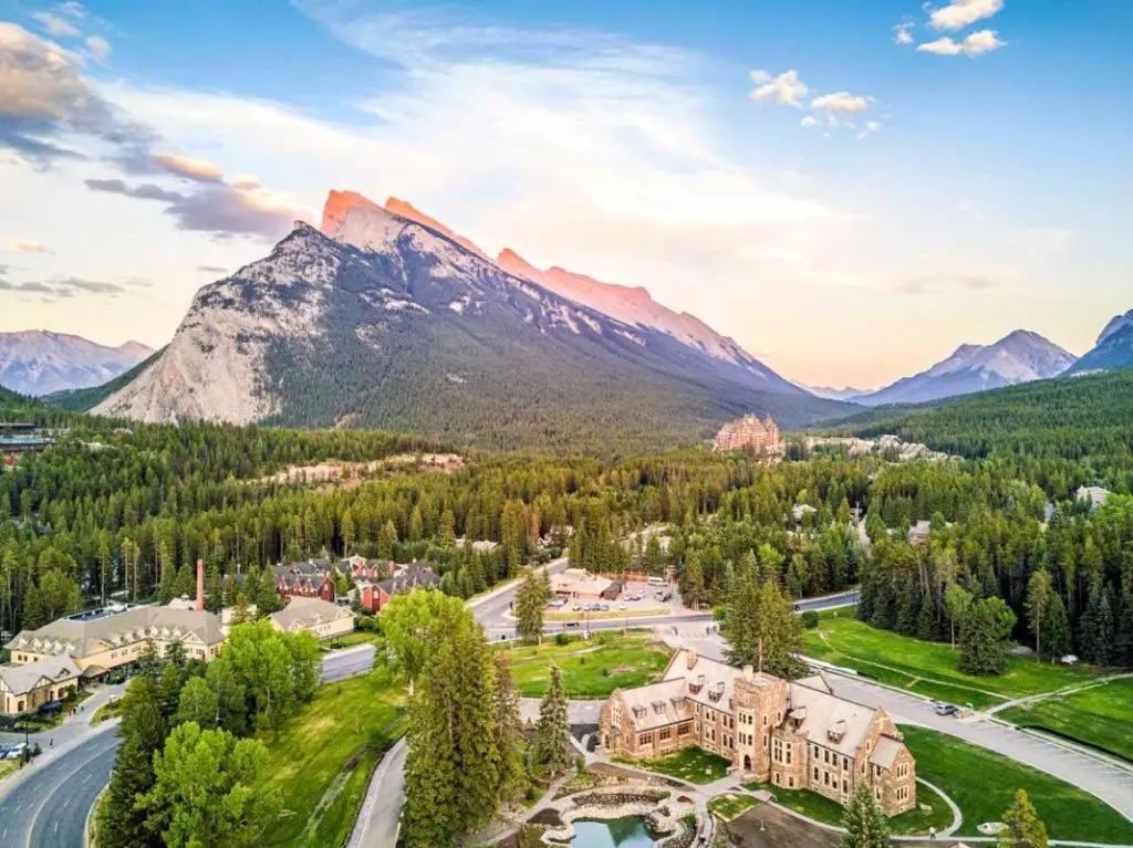 Aerial view of the Cascade Gardens of Time at the south end of Banff Avenue, with Rundle Mountain in the distance
