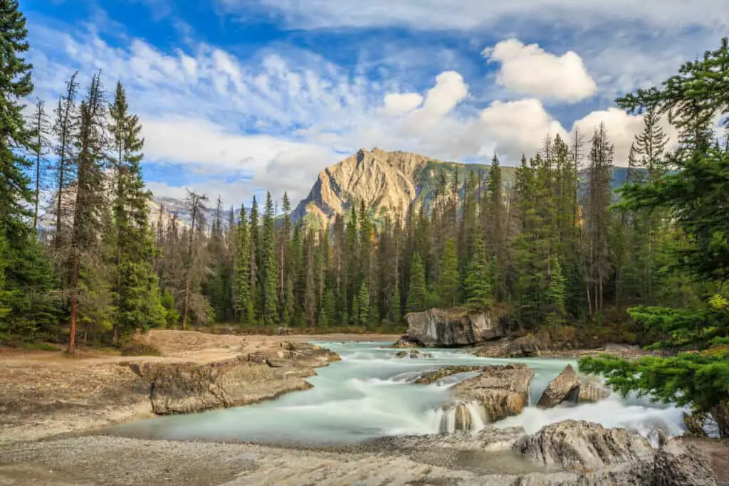 The sun shines over Mistaya Canyon in Jasper National Park, close to the Icefields Parkway.