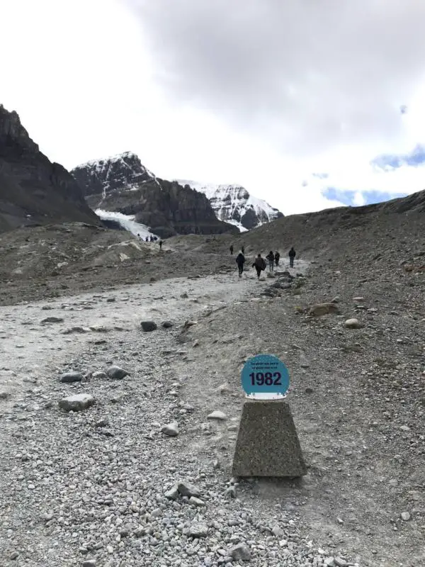 A sign indicating the former location of the base of the Athabasca Glacier