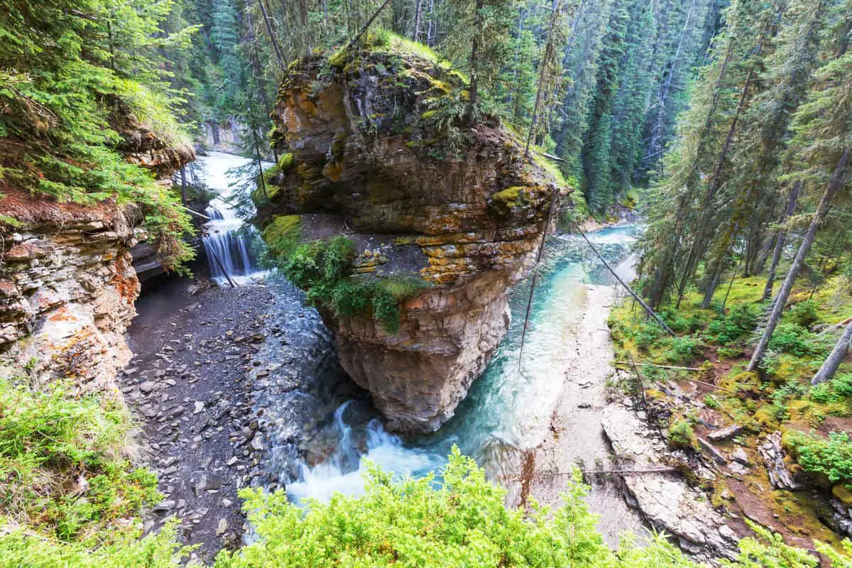 Bend in Johnston Canyon in Banff National Park with water rushing around it