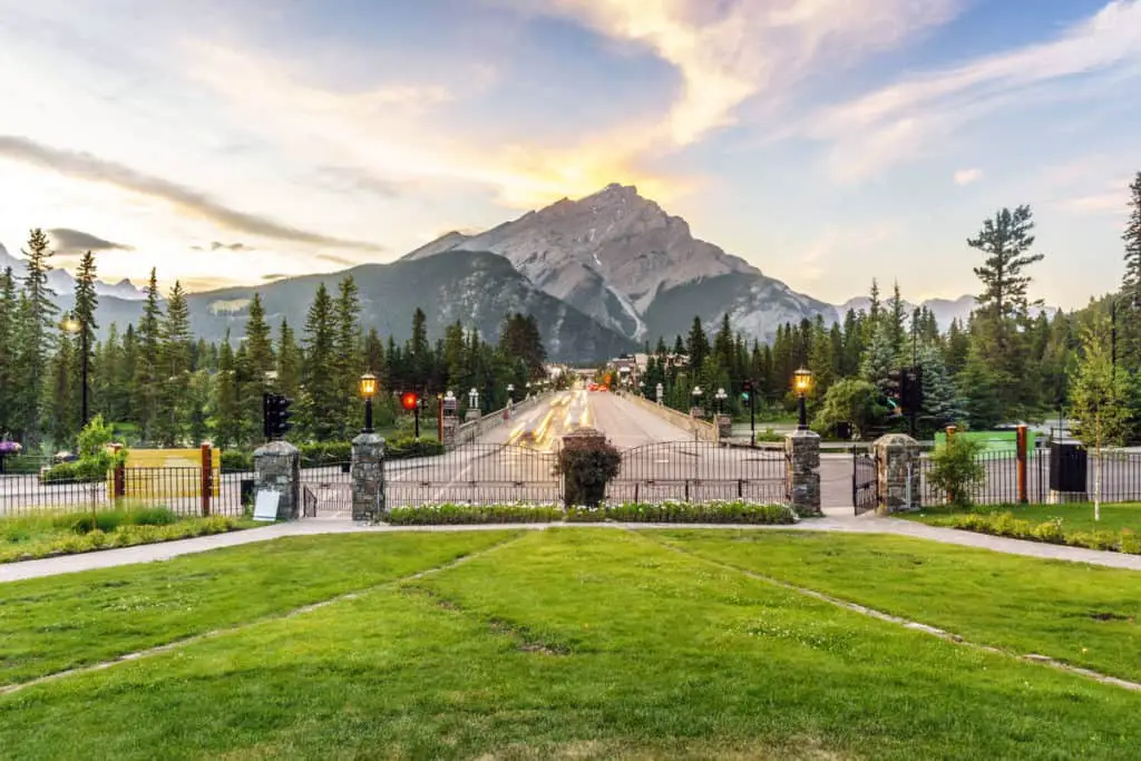 Cascade mountain towering above Banff Avenue during sunset in July, seen from the Cascade of Time Garden