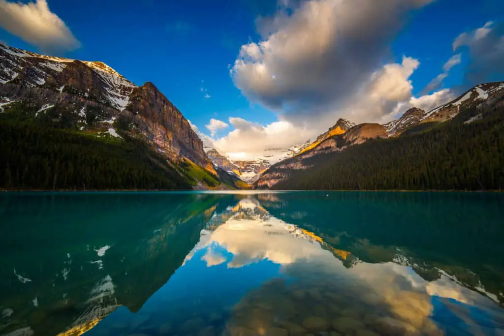 Sunrise over a cloudy lake Louise with its turquoise water the lake is famous for
