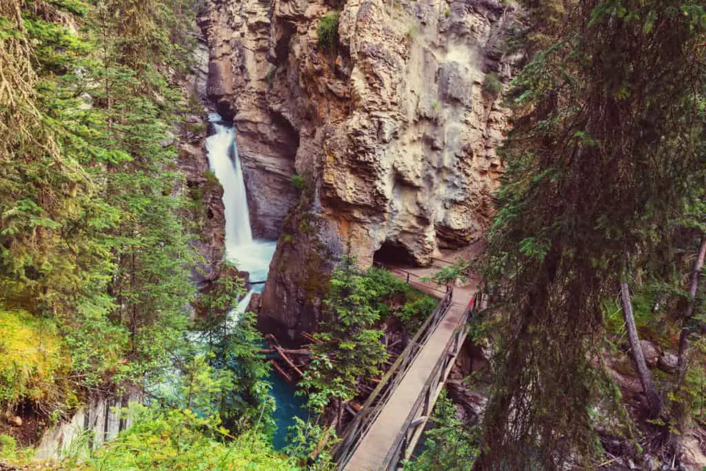 The boardwalk through Johnston Canyon seen from above with on the left the Upper Falls