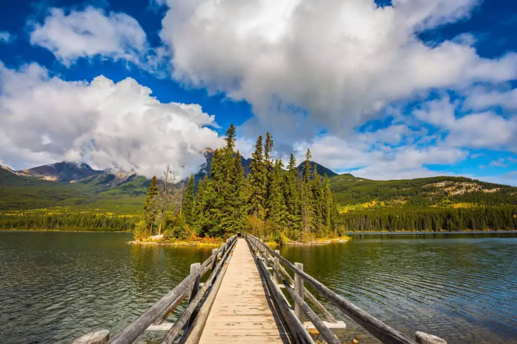 A wooden bridge leading to the island in the middle of Pyramid Lake in Jasper National Park