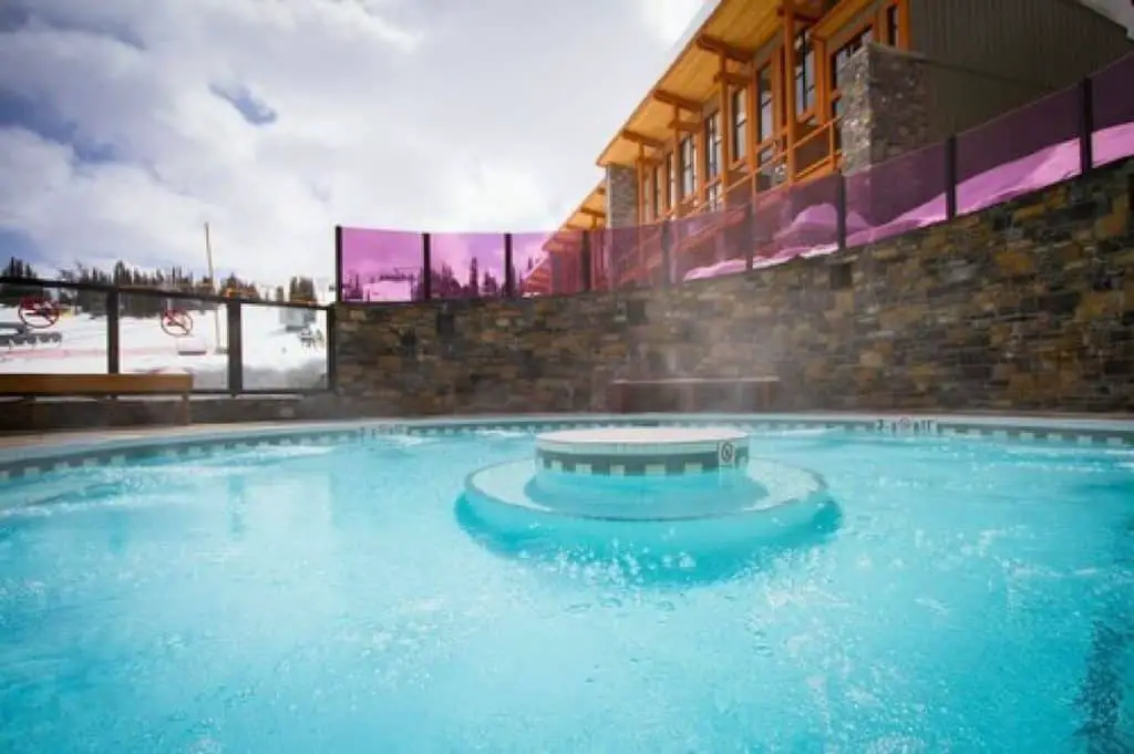 The outdoor pool at the Sunshine Mountain Lodge at Sunshine Mountain Ski Resort in Banff National Park
