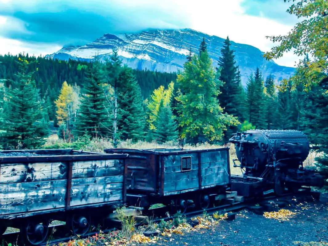 Freight cars of an abandoned coal train in the old town of Bankhead near the town of Banff in the Canadian Rocky Mountains