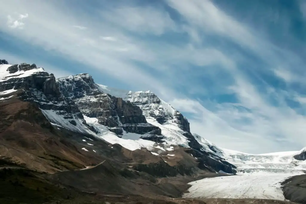 The Athabasca Glacier on the right, on the left peaks of the Canadian Rocky Mountain in Jasper National Park