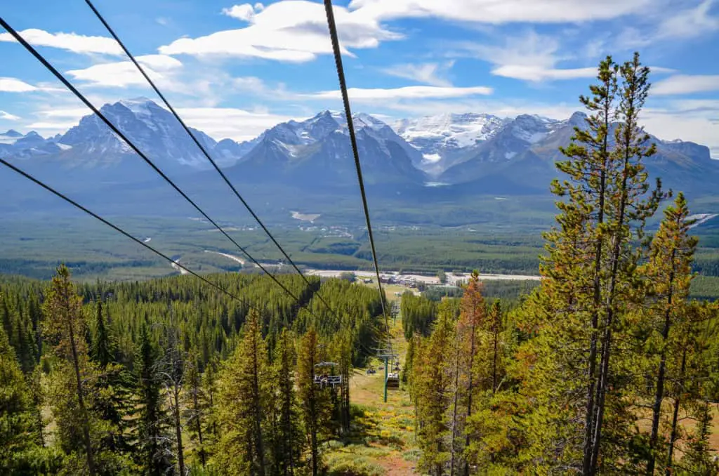 The sightseeing gondola in Lake Louise with Mount Victoria and Lake Louise seen in the distance