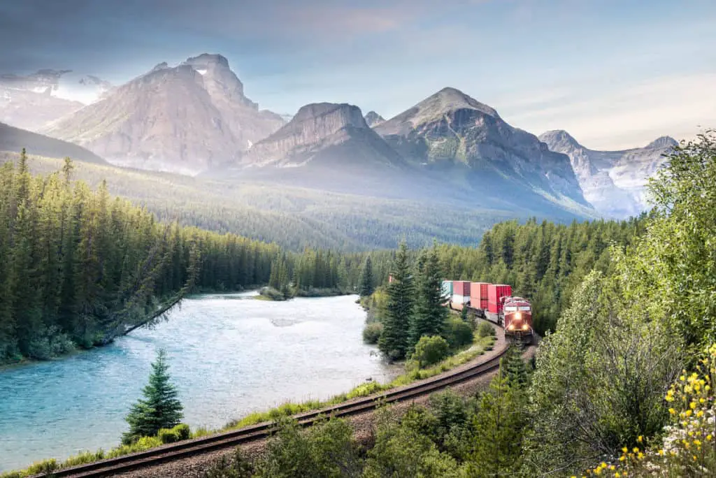 A freight train passing through Morant's Curve near the Bow Valley Parkway in Banff National Park