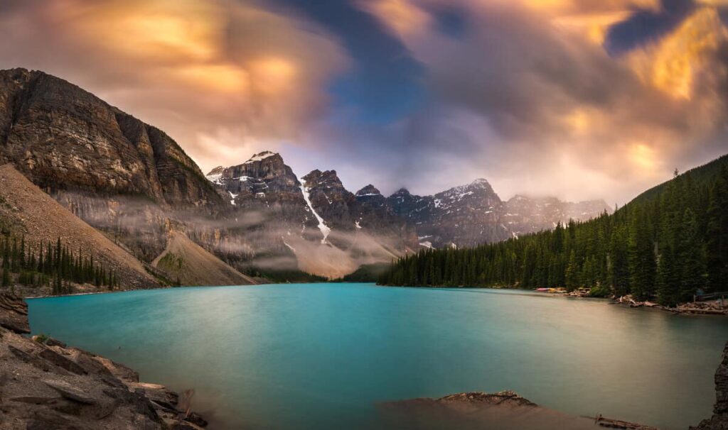 Rain clouds over Moraine Lake and the Valley of the Ten Peaks during summer in Banff National Park