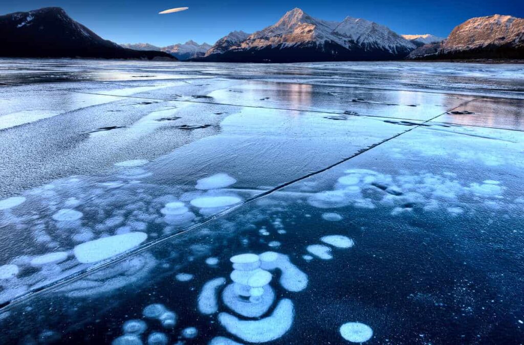 Bubbles of methane are contained in the ice of Abraham Lake in winter