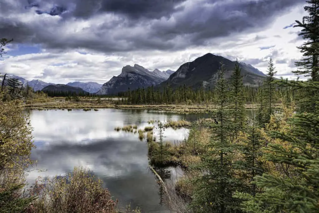 Vermilion Lakes provide a stunning backdrop for a tranquil stand-up paddleboarding experience