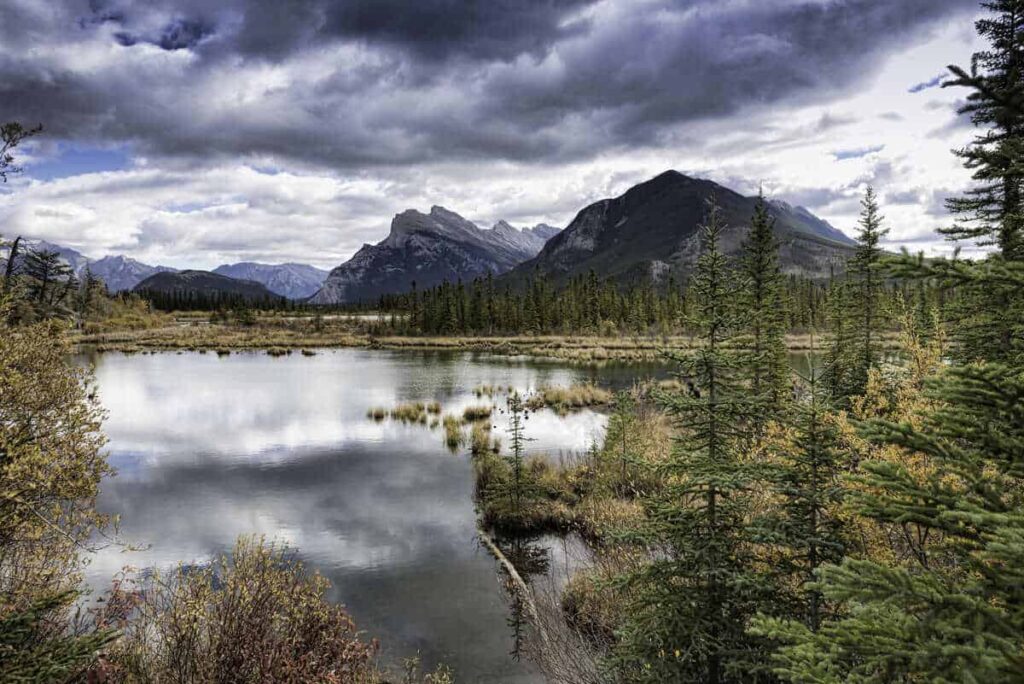 Vermilion Lakes provide a stunning backdrop for a tranquil stand-up paddleboarding experience