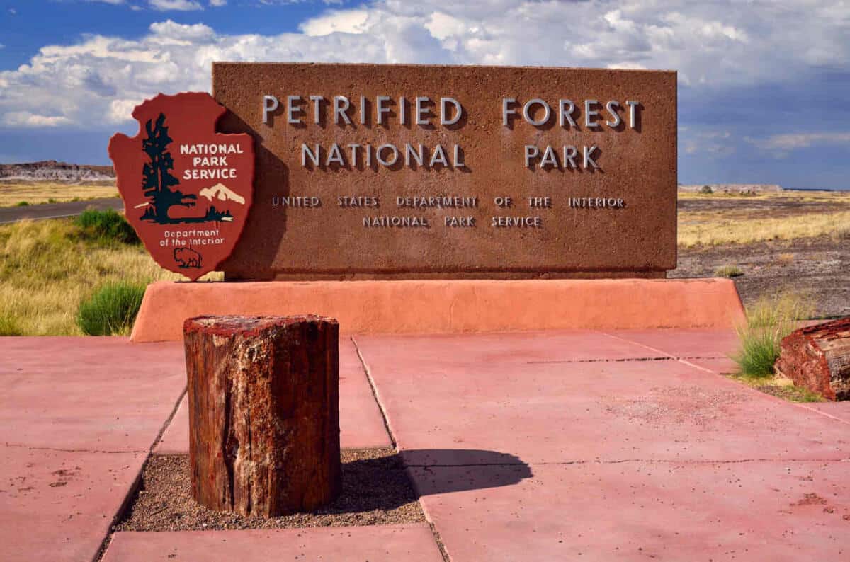 Sign post at the entrance of the Petrified Forest National Park in Arizona.